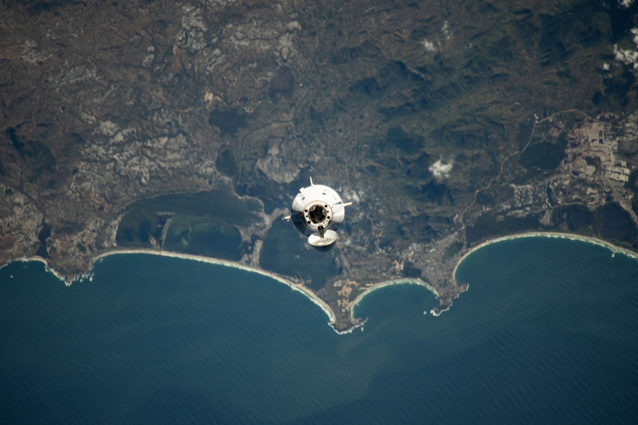 The SpaceX Dragon carrying the Axiom Mission 4 private-astronaut crew approaching the space station over southern Madagascar