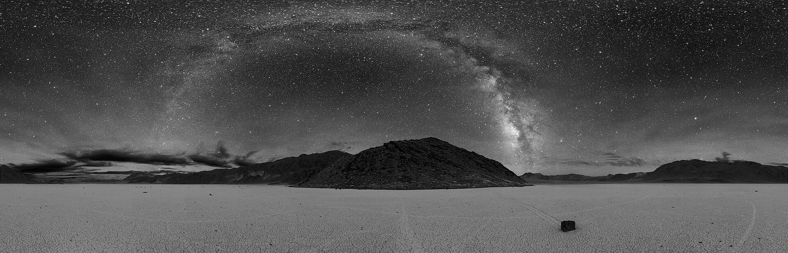 The Milky Way over Death Valley’s Racetrack Playa — the kind of dense starfield Clyde Tombaugh had to search one photographic plate at a time