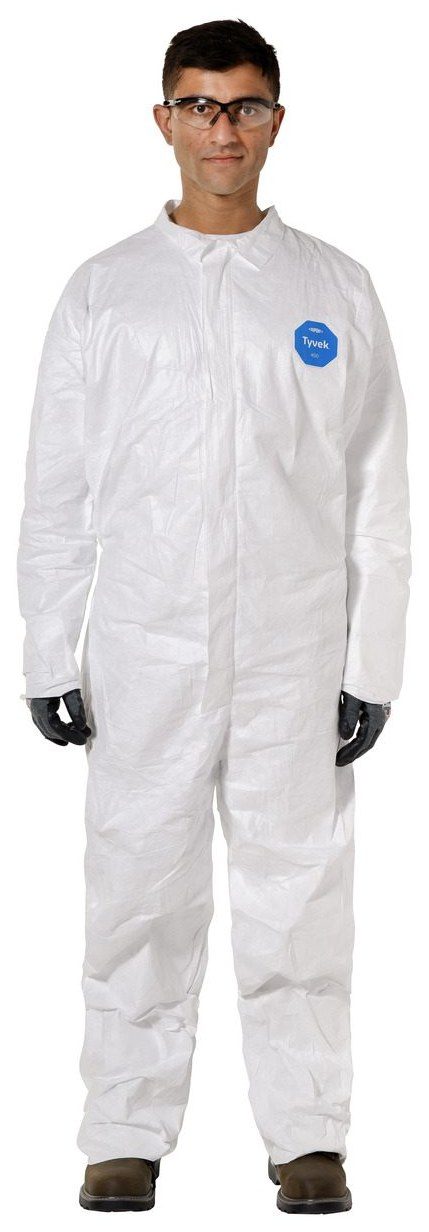 A model wearing the white DuPont Tyvek 400 coverall, full length, with the front zipper closed and the blue Tyvek tag on the chest