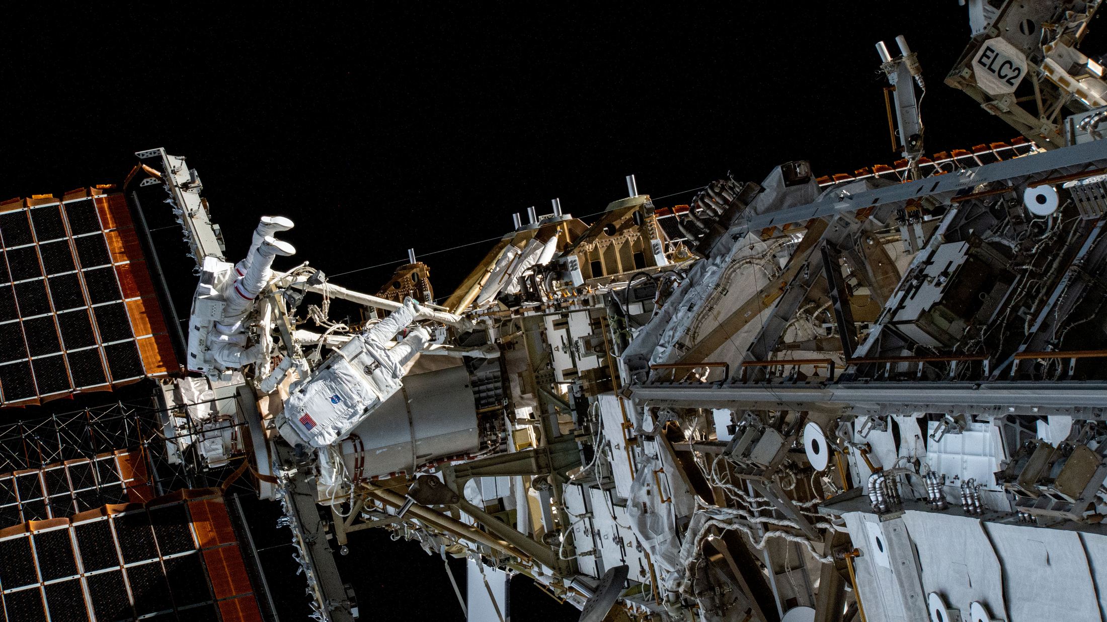 NASA astronauts Stephen Bowen and Sultan Alneyadi working outside the International Space Station during a 2023 spacewalk