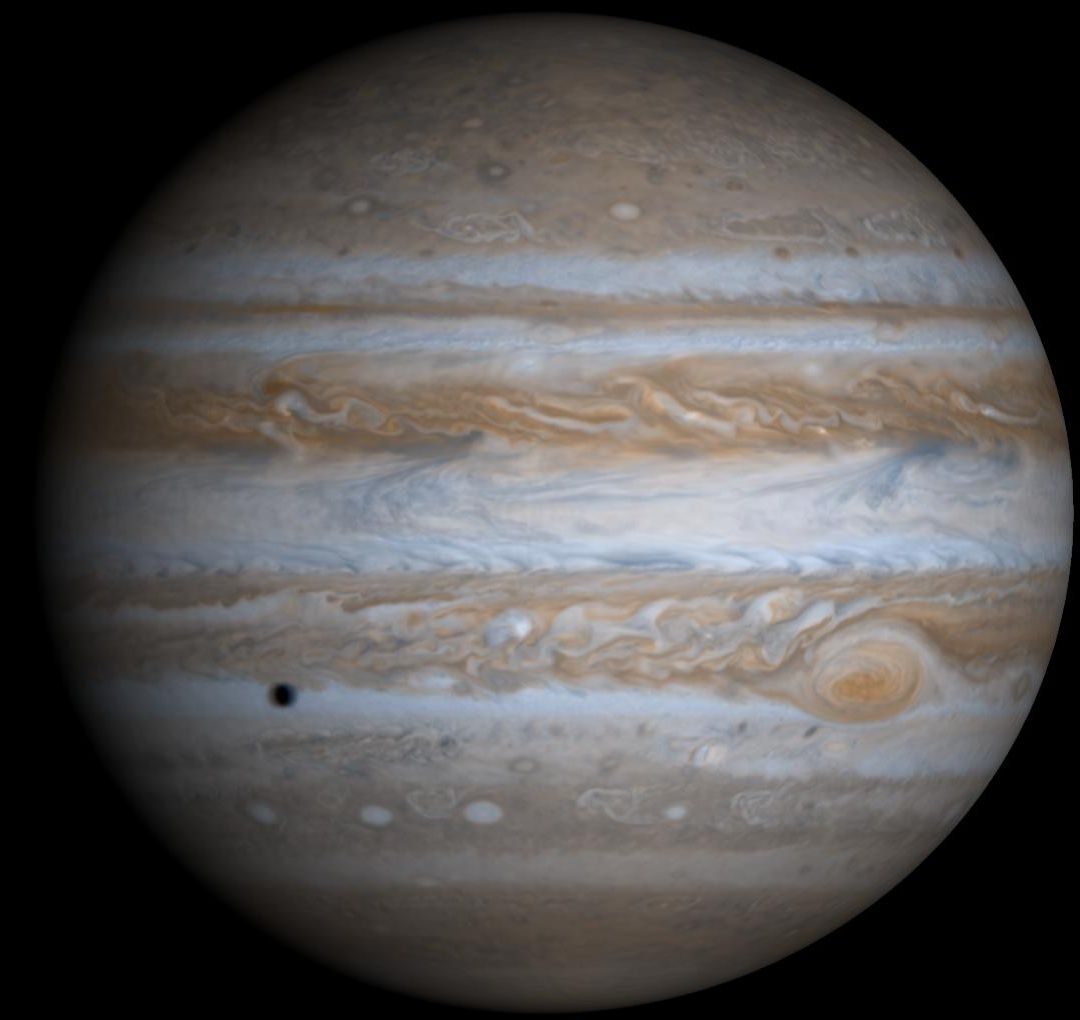 Jupiter&rsquo;s banded cloud tops photographed by NASA&rsquo;s Juno spacecraft, showing the alternating light zones and dark belts a small telescope reveals