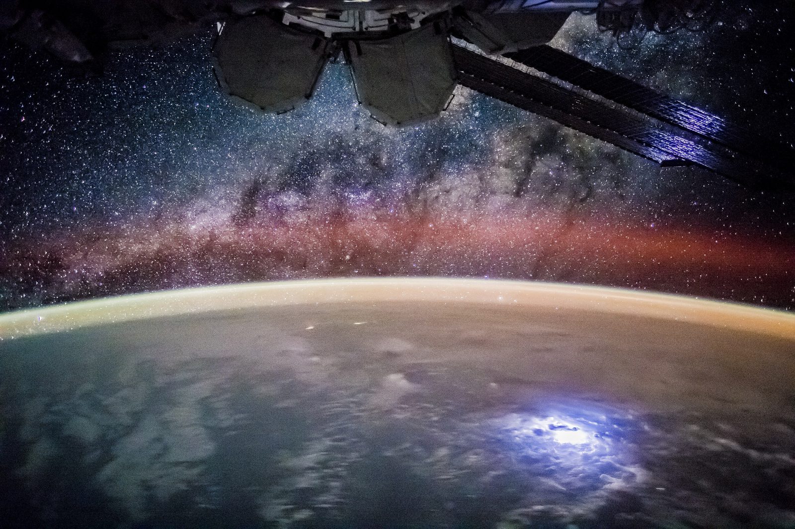The Milky Way’s bright core above Earth’s airglow, photographed from the International Space Station