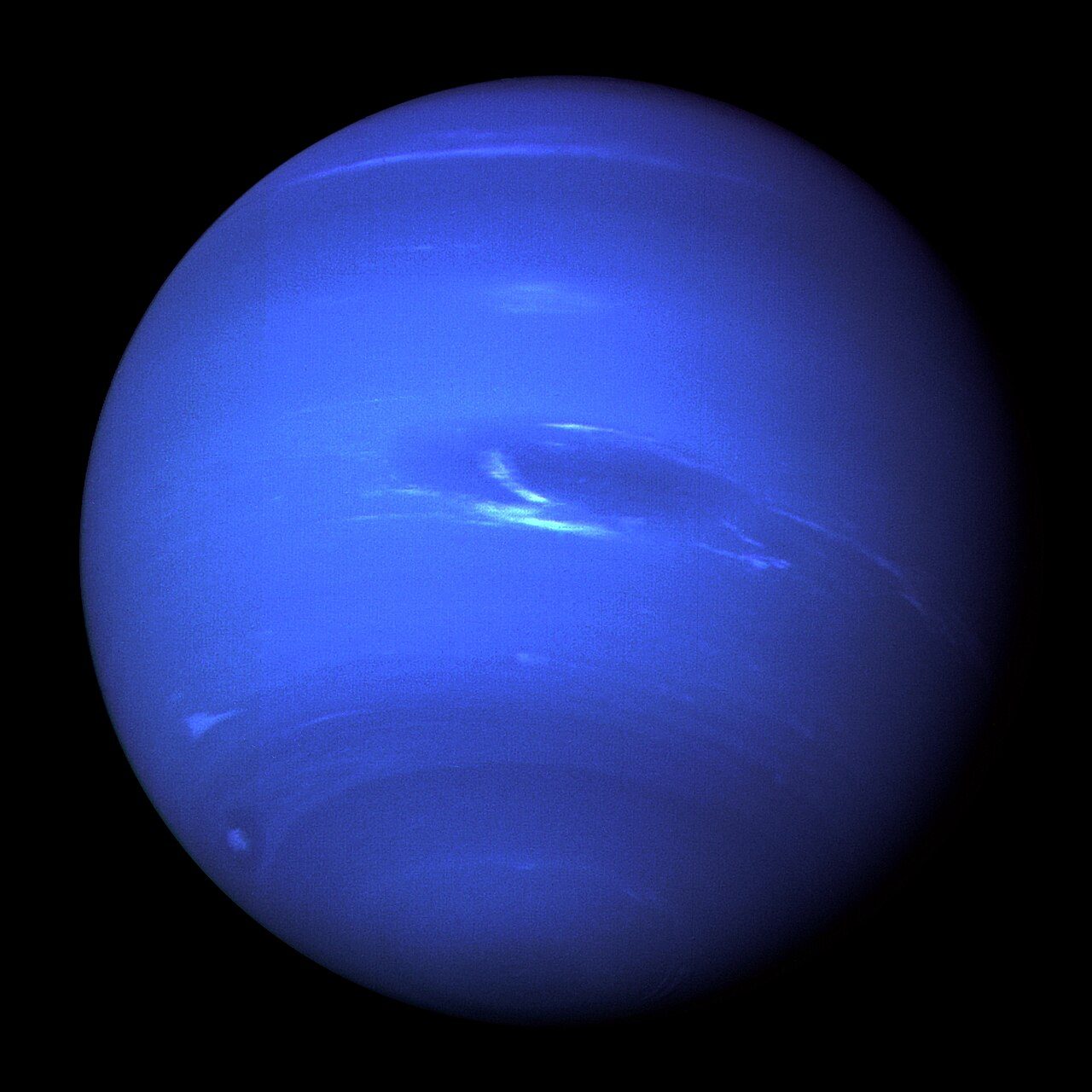 Neptune photographed by Voyager&nbsp;2, showing the deep blue disc and high cloud bands that no ground-based telescope resolves