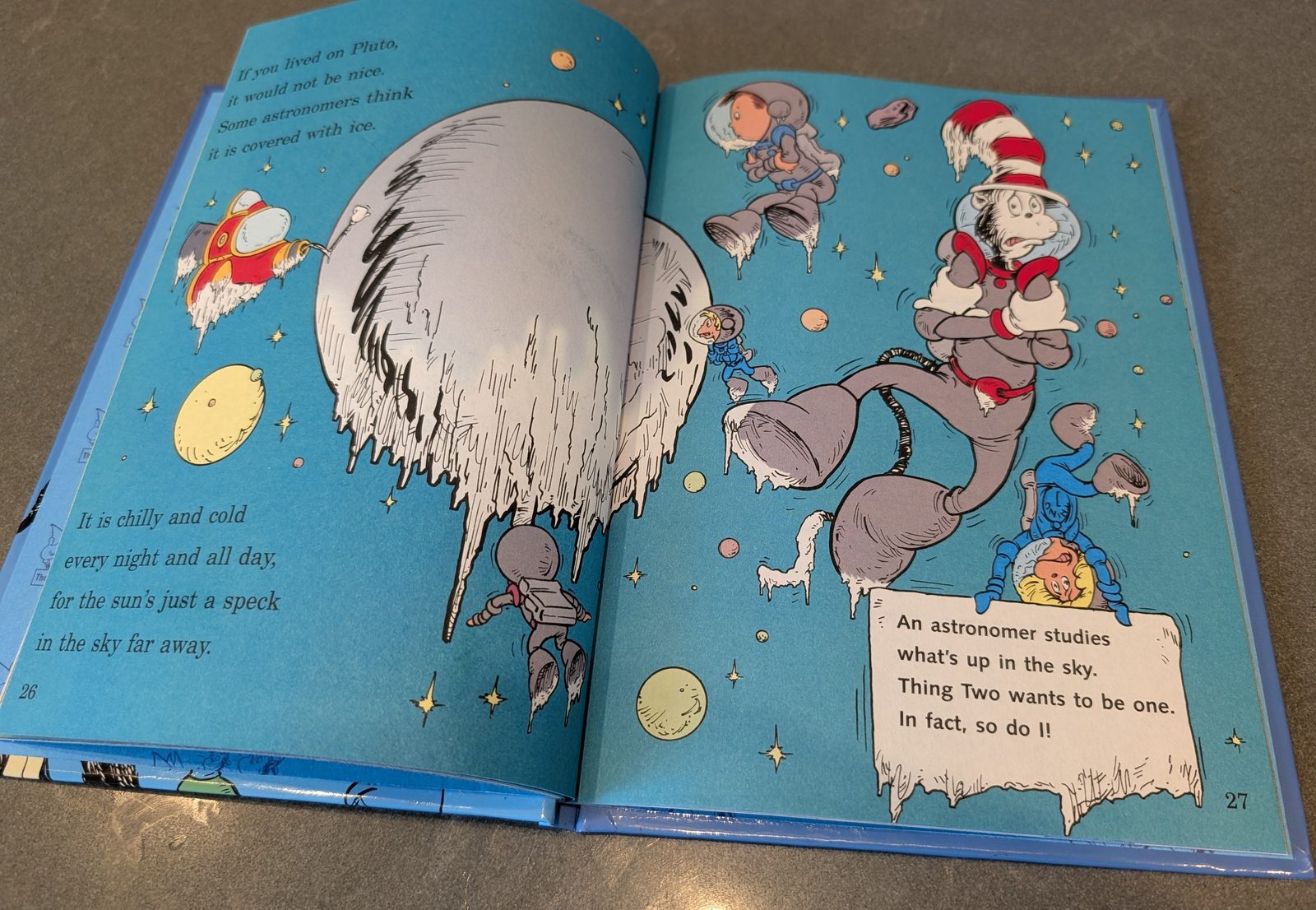 Pages 26 and 27 of the 1999 first edition of There&rsquo;s No Place Like Space!, a two-page spread devoted to Pluto: an icicle-covered world with the verse It is chilly and cold every night and all day, for the sun&rsquo;s just a speck in the sky far away
