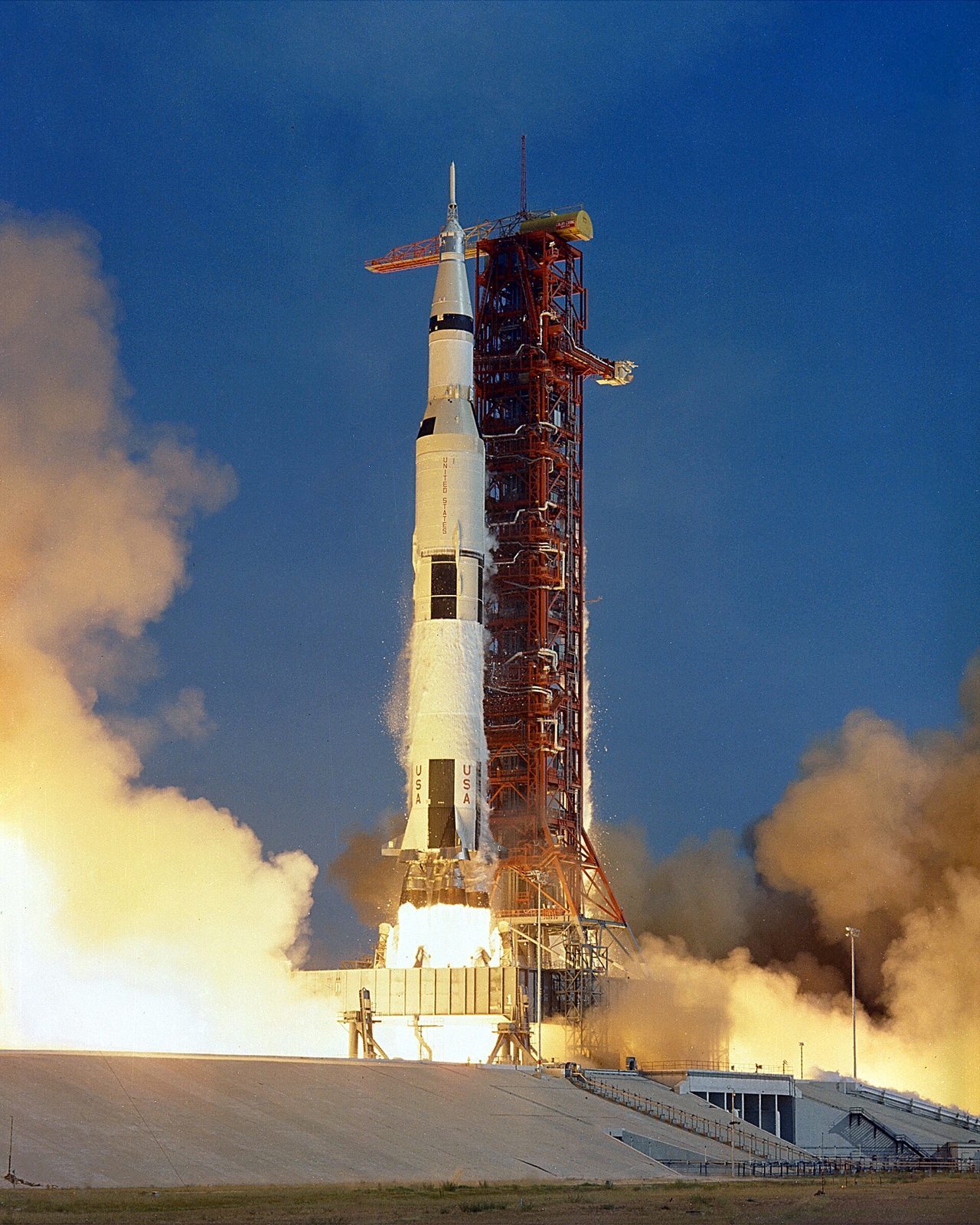 A Saturn V rocket launching on Apollo 11 -- the towering rocket now displayed at the Kennedy Space Center Visitor Complex