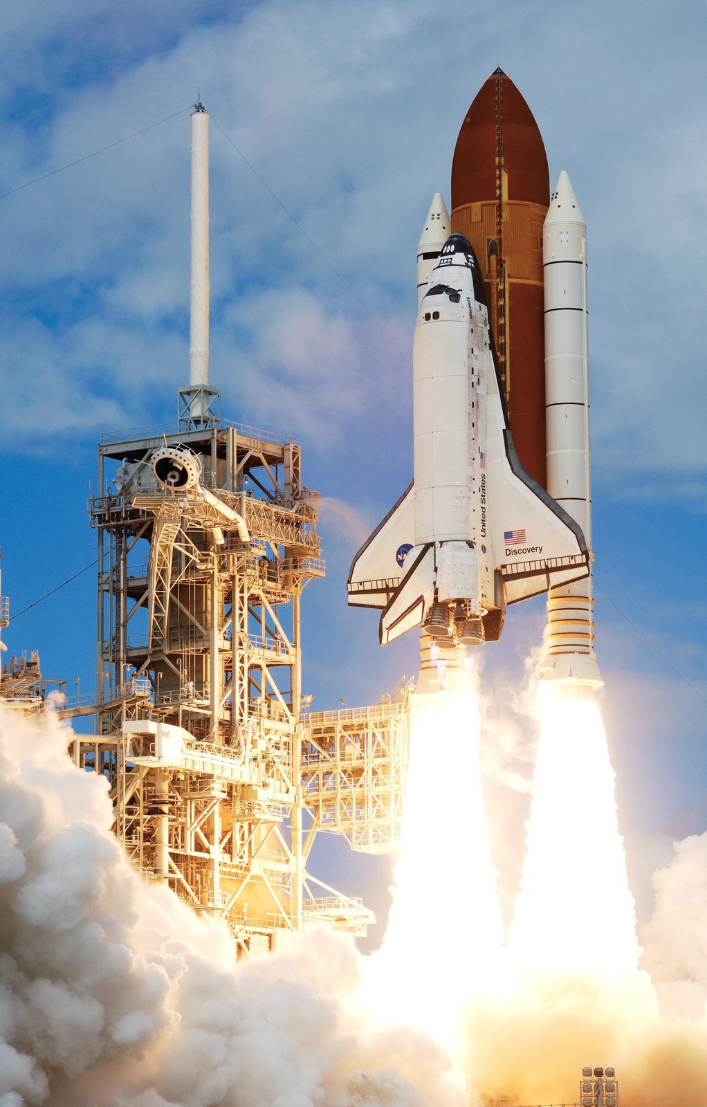 A Space Shuttle thundering off the pad at Kennedy Space Center