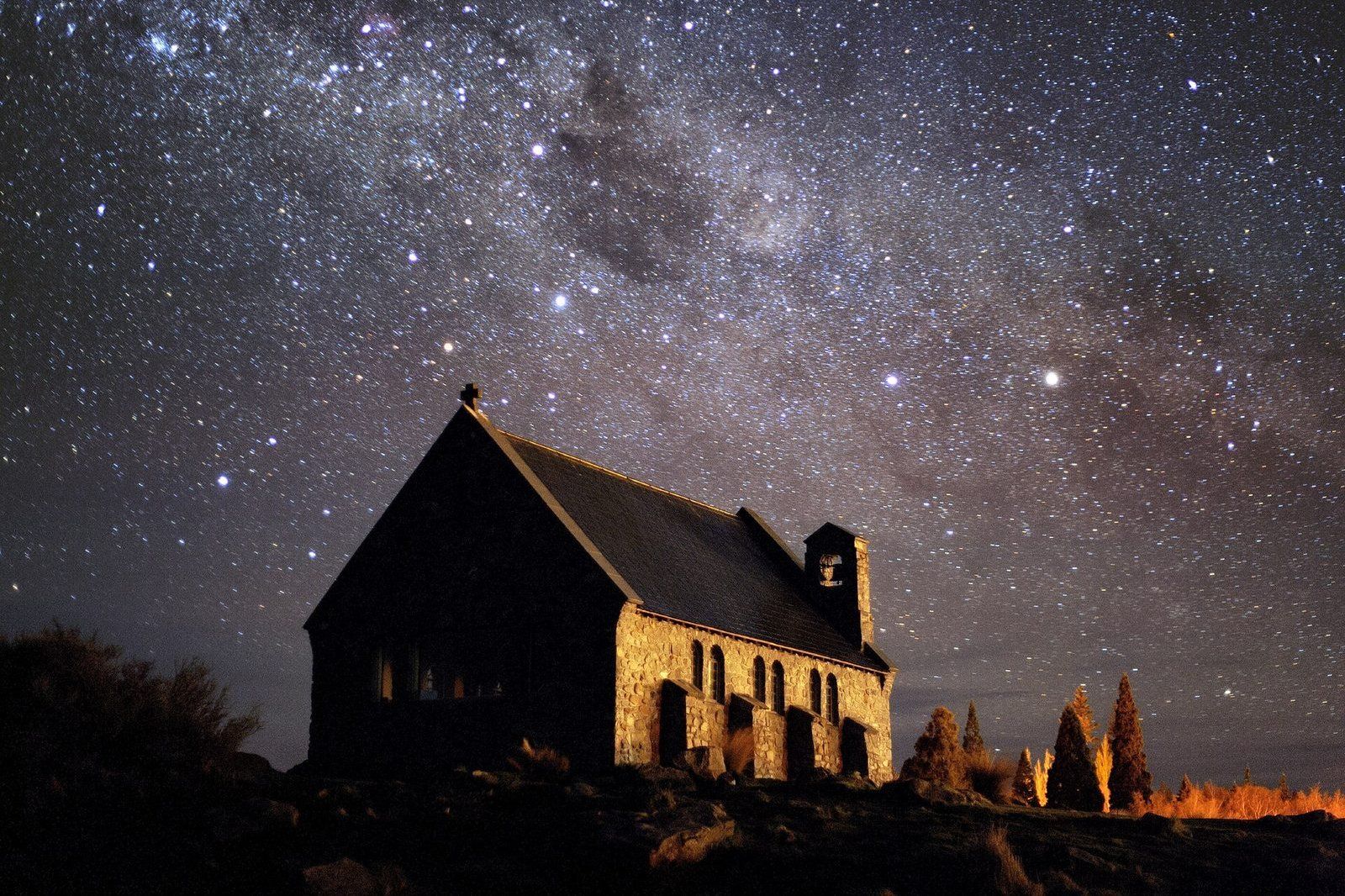 The Milky Way and the Southern Cross over the stone Church of the Good Shepherd on the shore of Lake Tekapo, New Zealand
