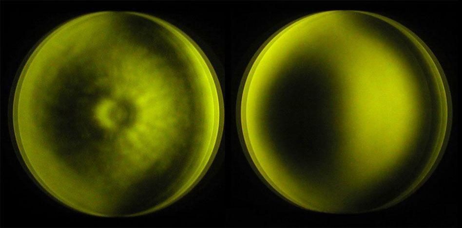 Two mirrors under a Ronchi grating: on the left an aerospace-certified mirror at Strehl 0.997 showing a rippled, mottled surface; on the right a Zambuto mirror, smooth